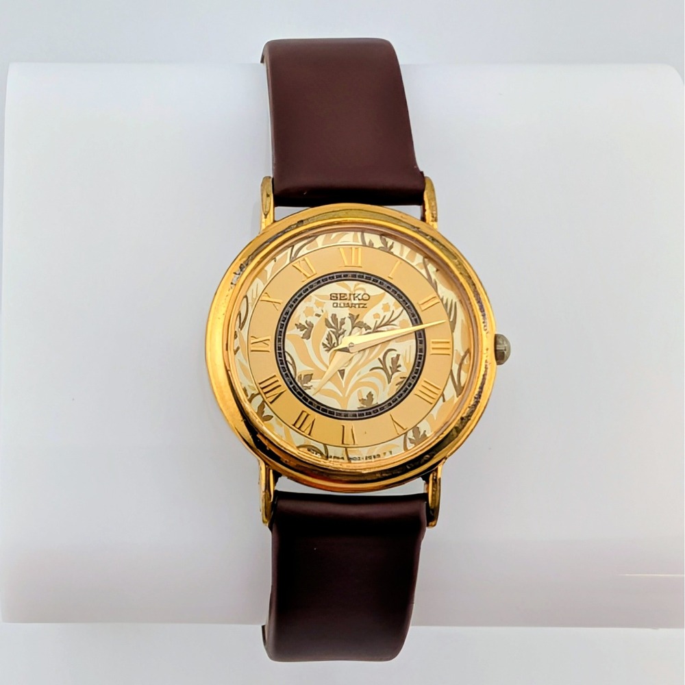 Seiko 1N00-0D59 Women's Gold Tone Floral Dial Roman Numeral Quartz Watch 26mm